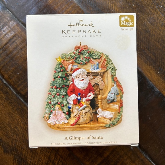 “New” in box Hallmark keepsake ornament “A Glimpse of Santa “ - Picture 1 of 5